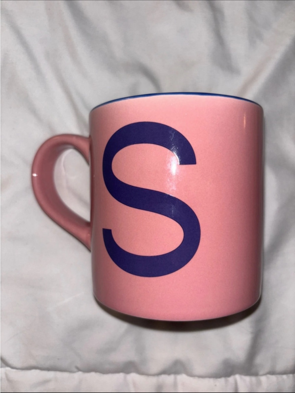 pink mug with purple S initial